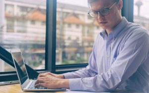 man working on his laptop